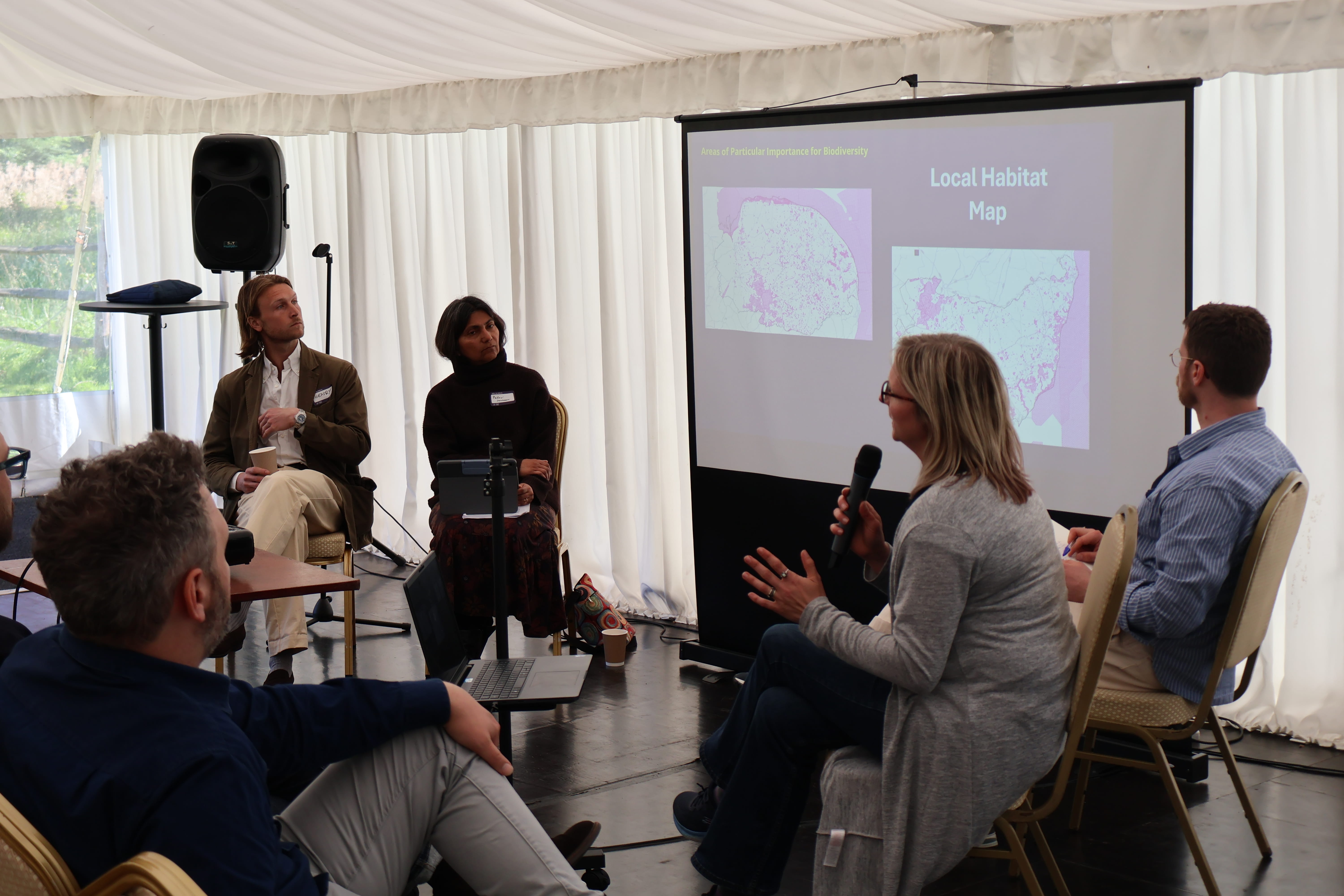 L-R: Henry Parkinson (Langley Abbey Environment Project), Pallavi Devulapalli (CPRE Norfolk), Jennifer Burlingham (Norfolk and Suffolk Nature Recovery Partnership, with microphone) and Morgan Taylor (Greengage) during one of the day's panels on delivering nature projects while navigating policy developments
